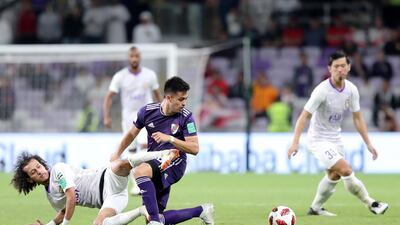 River Plate's Gonzalo Martinez and Al Ain's Mohamed Abdulrahman battle during the game between River Plate and Al Ain in the Fifa Club World Cup.