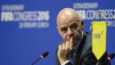 New Fifa president Gianni Infantino gestures during his first news conference following his election in Zurich on February 26, 2016. AFP PHOTO / OLIVIER MORIN