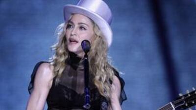 Madonna displayed her too-fit-for-50 arms during a performance in London last month.
