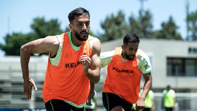 Jordan's forward Mousa Al-Tamari (L) runs with his teammates during a training session at the Nashama Training Centre in Amman on May 24, 2026, ahead of the 2026 FIFA World Cup football tournament. (Photo by Jewel SAMAD / AFP)