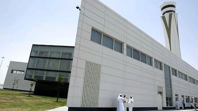 Emirati officials tour the control tower building at World Central-Al Maktoum International Airport in Dubai. AP Photo