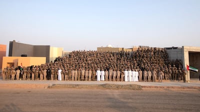 Sheikh Theyab bin Mohamed bin Zayed, Chairman of the Department of Transport, and Abu Dhabi Executive Council Member (front row 14th L), Lt General Hamad Thani Al Romaithi, Chief of Staff UAE Armed Forces (front row 22nd L), Hussein bin Abdullah, Crown Prince of Jordan (front row 23rd L), King Abdullah II, King of Jordan (front row 24th L), Sheikh Mohamed bin Zayed, Crown Prince of Abu Dhabi and Deputy Supreme Commander of the UAE Armed Forces (front row 25th L), Sheikh Tahnoon bin Mohamed, Ruler's Representative in Al Ain Region (front row 26th L), Brigadier General Saleh Mohamed Saleh Al Ameri, Commander of the UAE Ground Forces (front row 28th L), Sheikh Diab bin Tahnoon bin Mohamed (front row 32nd L), Mohamed Mubarak Al Mazrouei, Undersecretary of the Crown Prince Court of Abu Dhabi (front row 33rd L), Sheikh Mohamed bin Hamad bin Tahnoon (front row 34th L) and Sheikh Zayed bin Mohamed bin Hamad bin Tahnoon (front row 35th L), stand for a photograph with members of the UAE Armed Forces and the Jordanian Armed Forces.