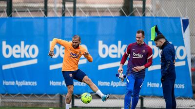 Barcelona defender Dani Alves and goalkeeper Marc-Andre ter Stegen take part in a training session. AFP