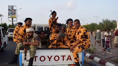 Members of Yemeni security arrive to secure a public gathering in the southern city of Aden on January 31, 2016. / AFP / SALEH AL-OBEID