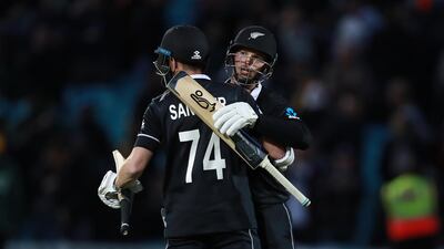 New Zealand batsmen Mitchell Santner, left, and Lockie Ferguson celebrate their thrilling victory against Bangladesh at The Oval. David Rogers / Getty Images