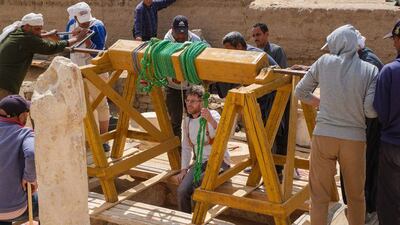 Descending into the burial shaft of Panehsy with the tambura. Photo: Servaas Neijens