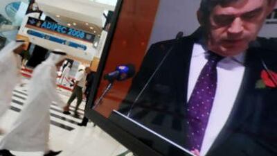 An image of Gordon Brown is displayed on a television monitor as he speaks at the ADIPEC 2008: Abu Dhabi International Petroleum Exhibition & Conference inside the Abu Dhabi National Exhibition Centre, on Nov 3 2008.