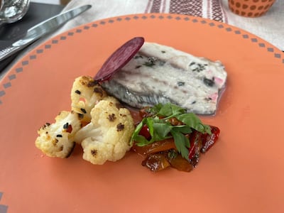 Poached barramundi with caramelised capsicum and fried cauliflower is a highlight of the meal