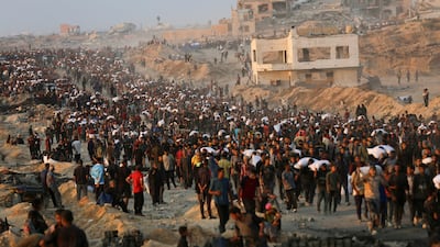 Palestinians gather for food, medicine and other aid supplies in Beit Lahia, northern Gaza. Reuters