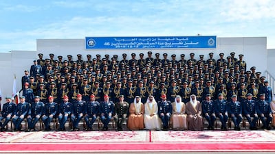 Sheikh Mohammed takes a commemorative photo with the graduates after the ceremony ends. Wam