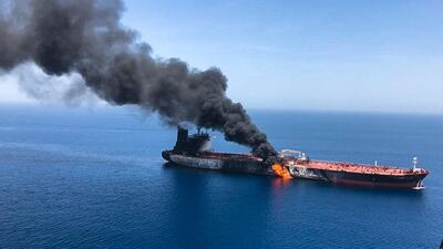 An oil tanker on fire in the Sea of Oman, near to the Strait of Hormuz, on June 13. AP
