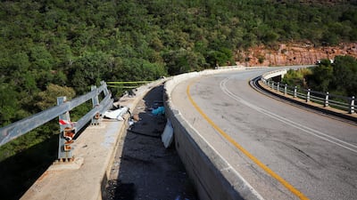 The bus crashed through a barrier on the Mmamatlakala bridge linking two mountainsides. Reuters