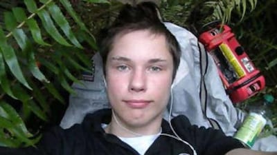 This undated image shows Colton Harris-Moore, aka the "Barefoot Bandit," using a stolen camera that was later recovered by deputies.