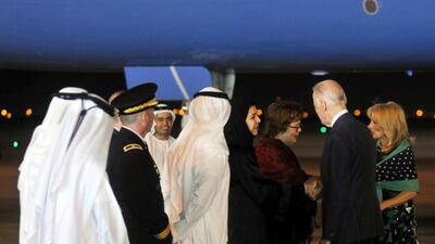 Joe Biden and his wife Jill are welcomed on arrival at Abu Dhabi airport. Wam