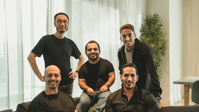 Jad Antoun, chief executive and co-founder of Huspy, centre, with the leadership team of the start-up. Photo: Huspy