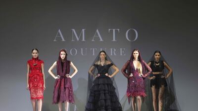 Amato Couture opens the event with its signature take on darkly Gothic eveningwear. AFP
