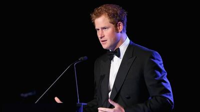 Britain’s Prince Harry gives a speech at the Sentebale 'Forget Me Not' dinner in Dubai. Chris Jackson / Getty Images