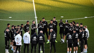 Real Madrid manager Zinedine Zidane talks to his players. AFP