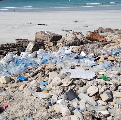 Plastic clogs a beach in Umm Al Quwain. Photo by Nic Muhl