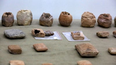 Antiquities returned to Iraq are displayed at the National Museum in Baghdad. AFP