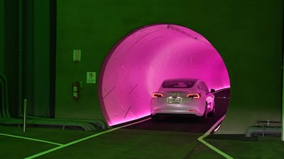 A Tesla car drives through a tunnel during a media preview of the Las Vegas Convention Centre Loop in 2021. Getty Images / AFP