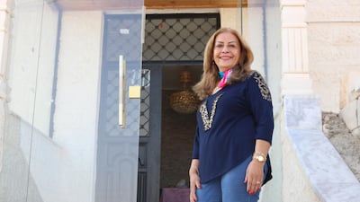 Wafa Yousif Tarawneh, who formed Jordan's first all-women electoral list, outside her makeshift office in Karak, southern Jordan. Taylor Luck for The National