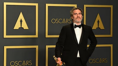 US actor Joaquin Phoenix in the press room with the Best Actor Oscar for 'Joker' during the 92nd Academy Awards at the Dolby Theatre in Hollywood on February 9, 2020. AFP