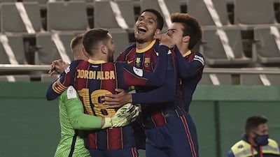 Barcelona players celebrate their victory over Real Sociedad. EPA