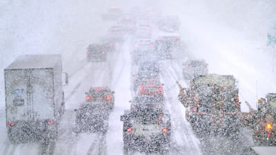 Brutal weather brings traffic to a virtual standstill in Londonderry, New Hampshire. AP