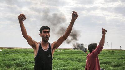 Palestinians demonstrate along along the Gaza-Israel border east of Khan Yunis in the southern Gaza Strip. AFP