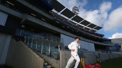 Jonathan Trott of Warwickshire takes to the field making his first senior appearance since the tour of Australia during the friendly match between Warwickshire and Gloucestershire at Edgbaston on Tuesday in Birmingham, England. Michael Steele / Getty Images/ April 1, 2014