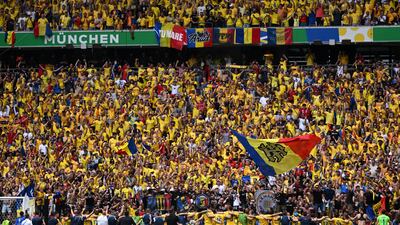 A general view as players of Romania celebrate victory in front of their fans. Getty Images