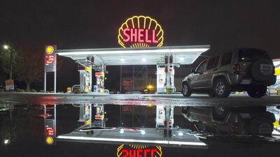 A vintage Shell sign is seen illuminated at a Shell gas station in Cambridge, Massachusetts. Brian Snyder / Reuters
