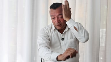Dubai resident Ram Kumar Rijal cries for the hundreds of friends and neighbours he lost in his hometown in the Trishuli Bazaar area of Nepal. Chris Whiteoak / The National