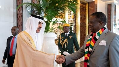 Ahmed Al Zaabi, UAE Deputy Minister of Presidential Affairs, greets Emmerson Mnangagwa, President of Zimbabwe, at the Presidential Airport in Abu Dhabi. Ryan Carter for the Ministry of Presidential Affairs
