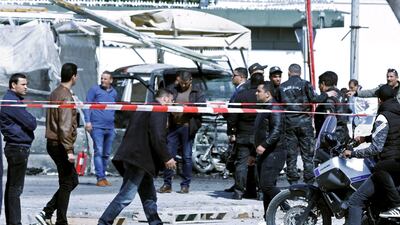 People gather at the site of a suicide attack near the US embassy in Tunis. Reuters