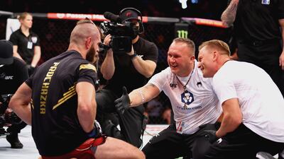 Jiri Prochazka celebrates with his team after defeating Glover Teixeira by submission to become the UFC light heavyweight champion at UFC 275 at Singapore Indoor Stadium on June 12, 2022 in Singapore. Getty