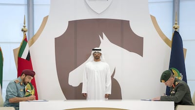 Sheikh Mohammed bin Zayed witnesses a MOU between UAE Minister of Interior and Rabdan Academy. Rashed Al Mansoori / Crown Prince Court - Abu Dhabi