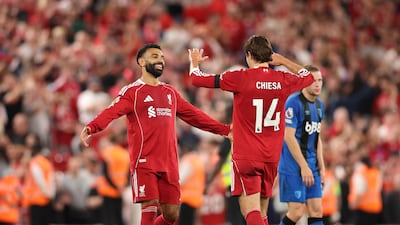Mohamed Salah of Liverpool, left, celebrates after their win over Bournemouth. EPA