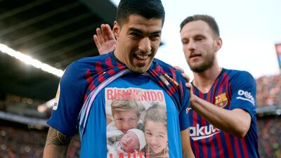Barcelona's Uruguayan forward Luis Suarez celebrates a goal during the Spanish league football match between FC Barcelona and Real Madrid CF at the Camp Nou stadium in Barcelona. AFP
