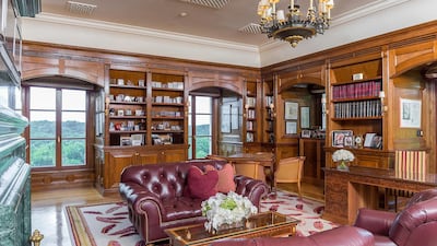 A bookshelf-lined study complements the main bedroom suite