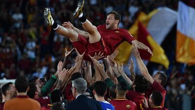 Roma's long-serving captain Francesco Totti ended his playing career in 2017. Vincenzo Pinto / AFP