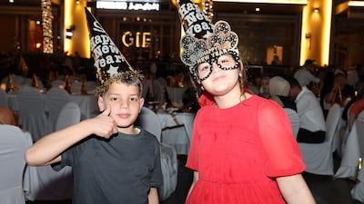 Children ready for New Year Eve's celebrations at Dubai Mall. Pawan Singh / The National