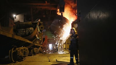 Molten steel is moved through the Metinvest Ilyich Iron and Steel Works. Rinat Akhmetov, the owner of the factory and richest man in Ukraine, has enlisted his 300,000 employees to end the turmoil unleashed by the armed takeover of pro-Russian separatists in Mairupol. John Moore / Getty Images