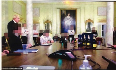 Boris Johnson pictured at a gathering in Downing Street on January 14, 2021, in a photo released by the Privileges Committee. Photo: UK Parliament