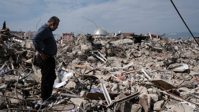 A shop owner visits the ruins of his store on February 25, 2023, in Hatay, Turkey. Getty