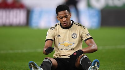 Anthony Martial - £250,000 a week. AFP