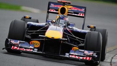 Sebastian Vettel, the Red Bull driver, powers to a pole position in Melbourne yesterday.