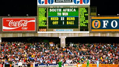 The scoreboard tells the story as England win a controversial rain affected game in the World Cup semi-final against South Africa in Sydney. The target was again revised to 21 needed from one ball. Allsport