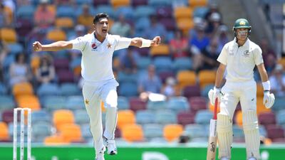 Pakistan's 16-year-old bowler Naseem Shah celebrates getting his first Test wicket, Australian David Warner, at the Gabba. EPA